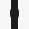 Das schwarze Piercing-Kleid Das schwarze Piercing-Kleid