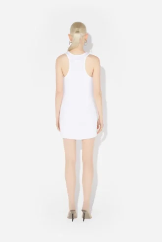 Das weiße Strumpfhalter-Kleid