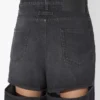 Die schwarze Cut-Out-Jeans Die schwarze Cut-Out-Jeans